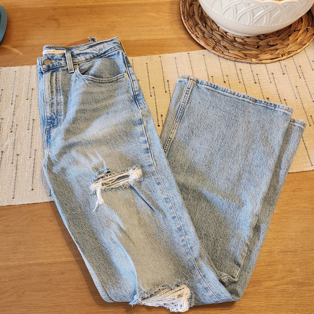Distressed Light Blue Jeans